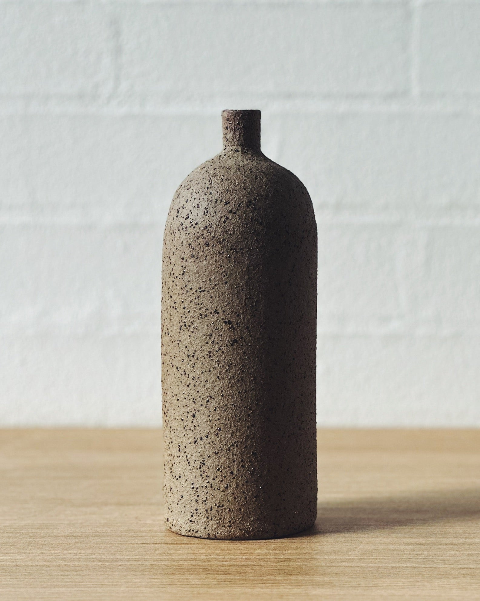 dark speckled vaseUP bottle