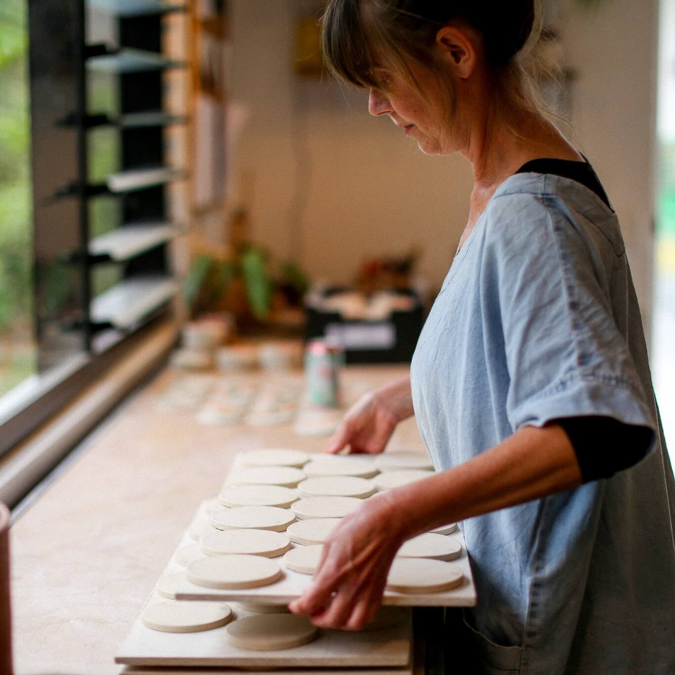Jenn Johnston making ceramic coasters for Stone and Wood collaboration