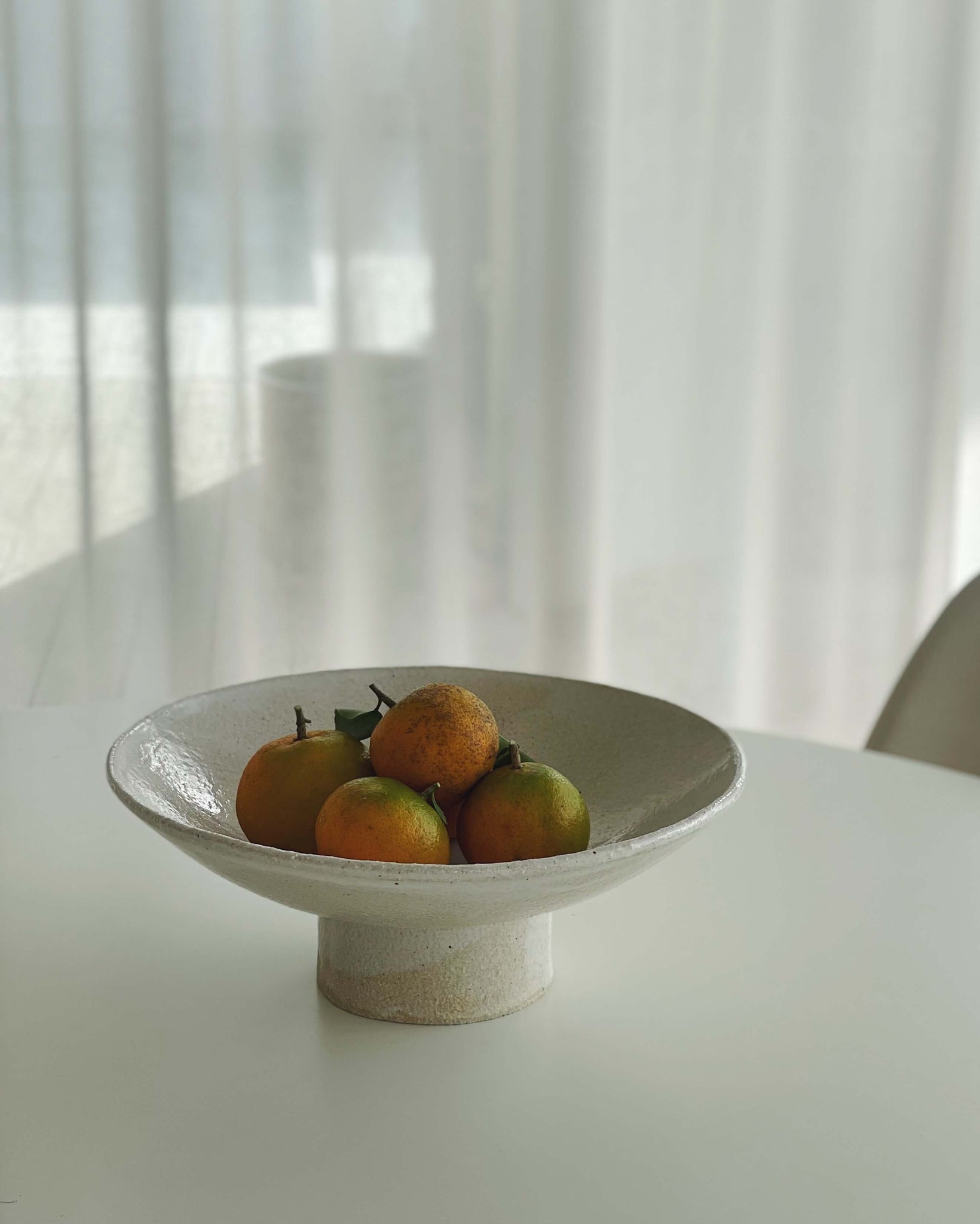 Jenn Johnston White fountain platter with mandarins