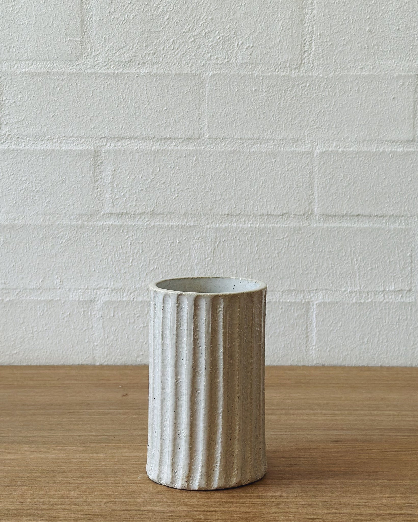 carved white vaseUP